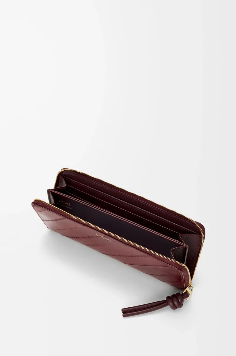 portefeuille fin zippé knot couleur anguille bordeaux foncé