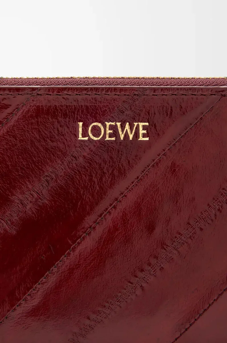portefeuille fin zippé knot couleur anguille bordeaux foncé