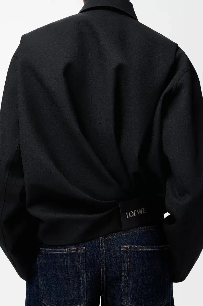 veste drapée en laine noire