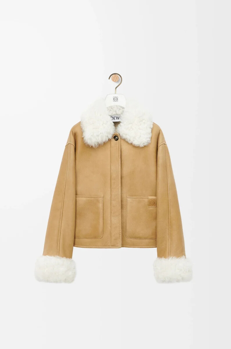 veste en peau lainée blanche et dorée