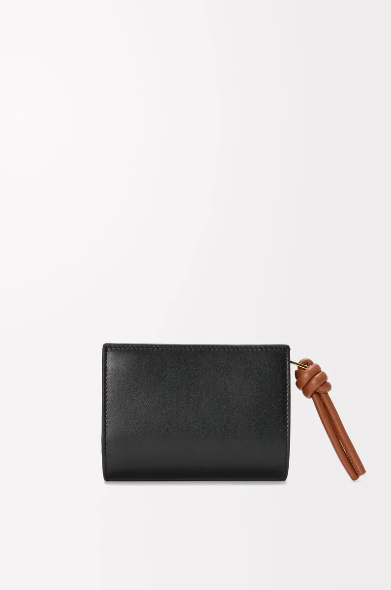 portefeuille compact knot en cuir de veau nappa brillant noirÉcureuil