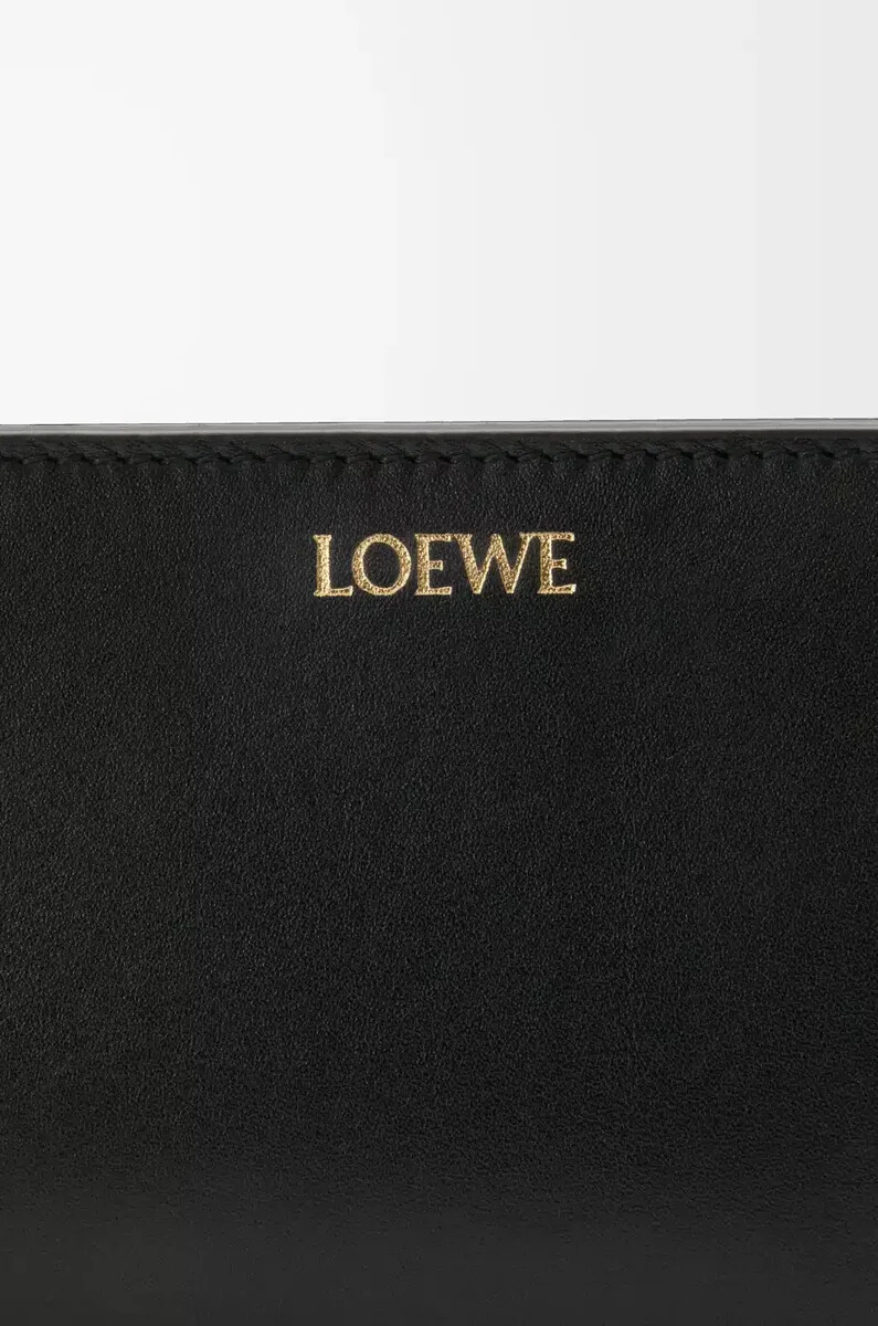 portefeuille compact knot en cuir de veau nappa brillant noirÉcureuil