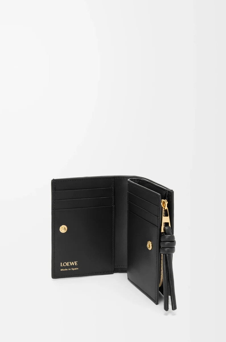 portefeuille compact knot en anguille noire