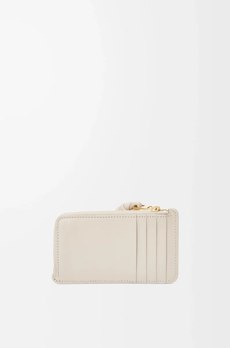 porte-cartes knot en cuir de veau nappa brillant couleur avoine claire