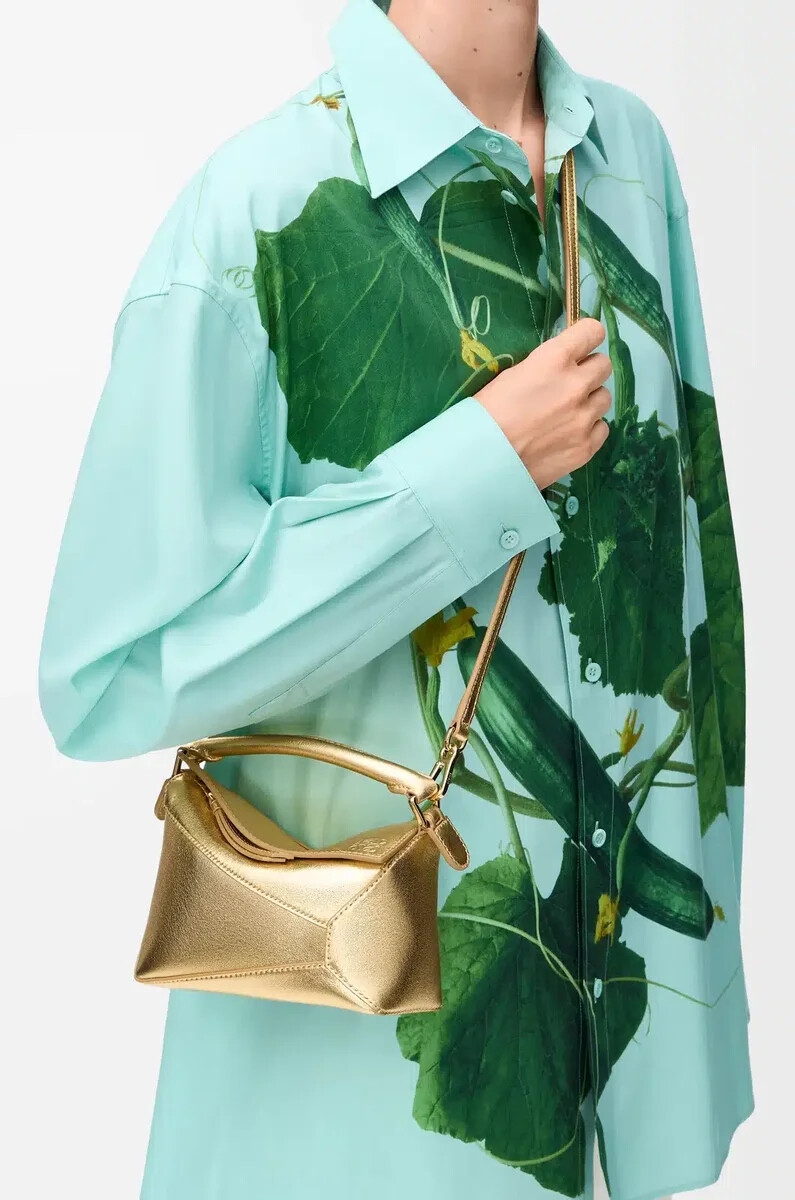 sac mini puzzle edge en cuir dagneau laminé doré