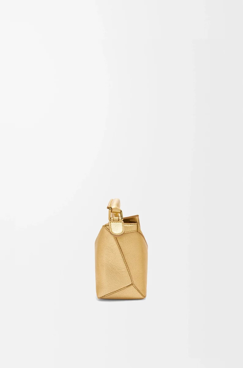 sac mini puzzle edge en cuir dagneau laminé doré