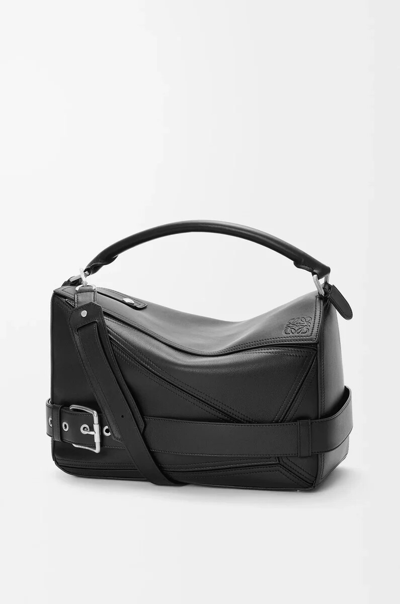 grand sac à dos puzzle biker en cuir de veau brillant noir