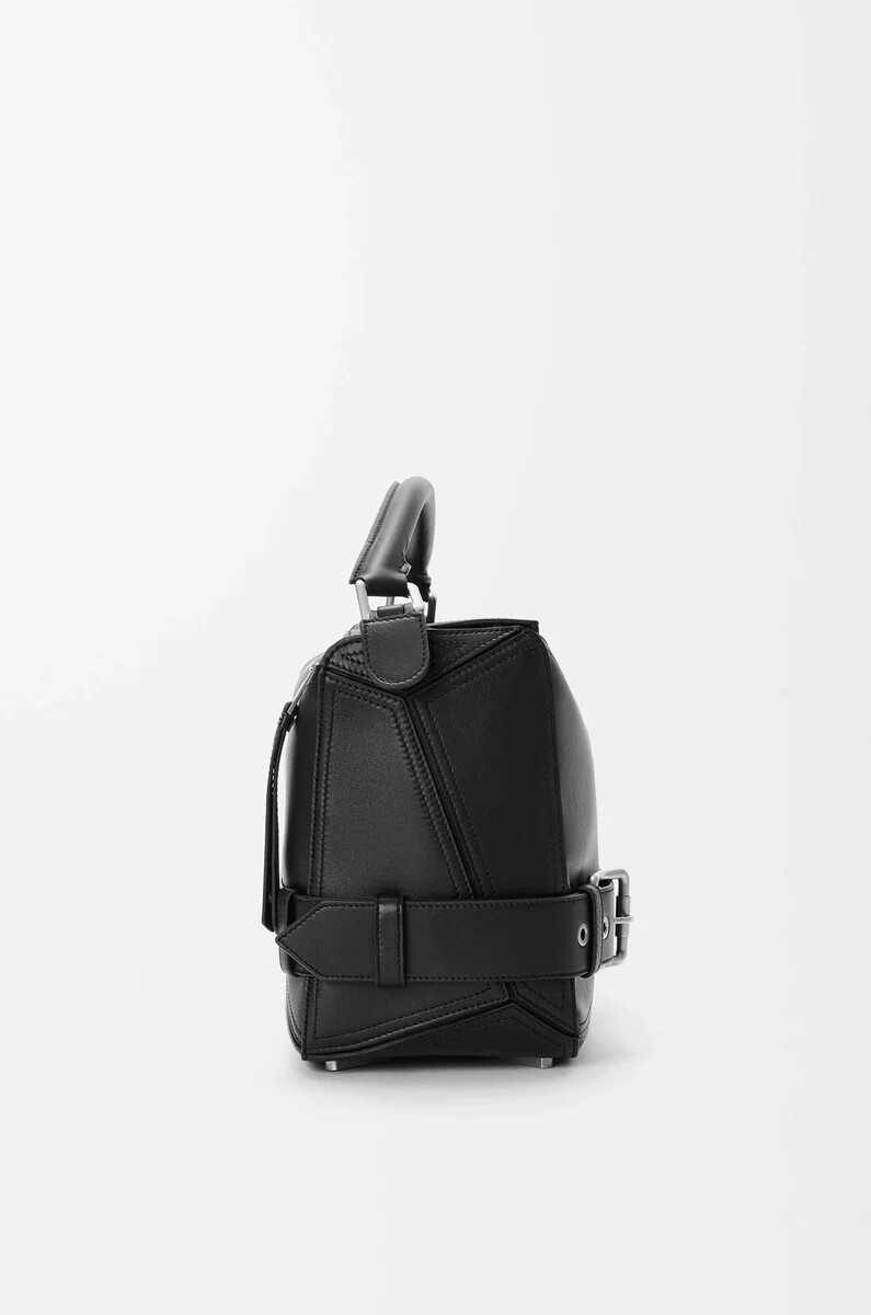 grand sac à dos puzzle biker en cuir de veau brillant noir